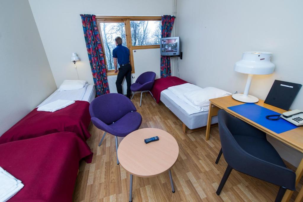 Sydspissen Hotel Тромсе Номер фото